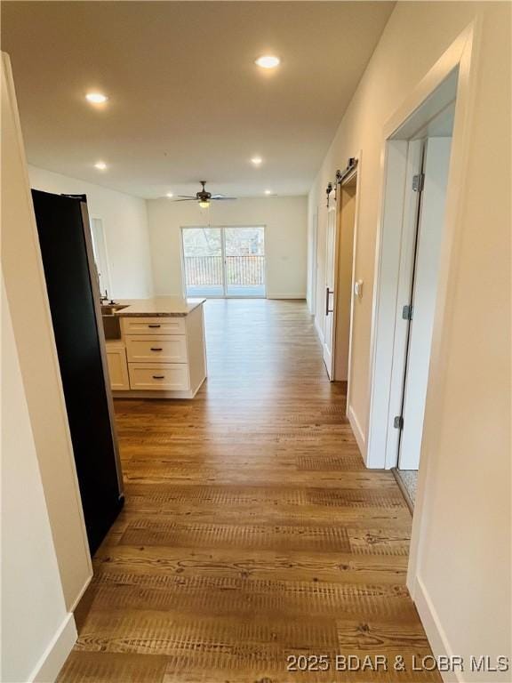 295 Highland Shores Dr Unit 5F, Lake Ozark, MO 65049 - hallway featuring wood finished floors and recessed lighting