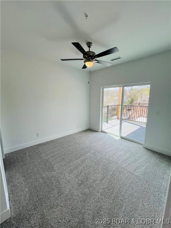 295 Highland Shores Dr Unit 5F, Lake Ozark, MO 65049 - carpeted spare room featuring ceiling fan and fire sprinkler in ceiling