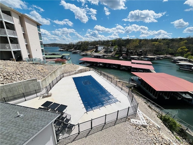 295 Highland Shores Dr Unit 4D, Lake Ozark, MO 65049 - view of swimming pool featuring a water view