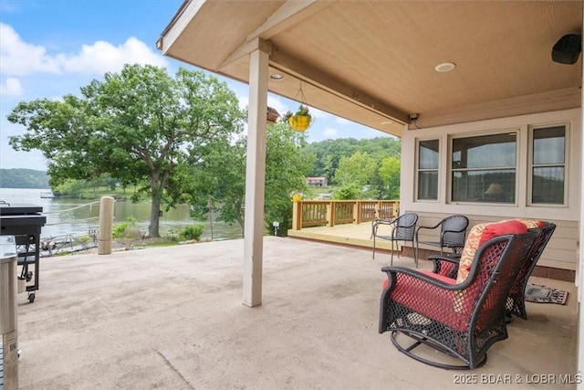 97 Random Rd, Edwards, MO 65326 - view of patio with a water view