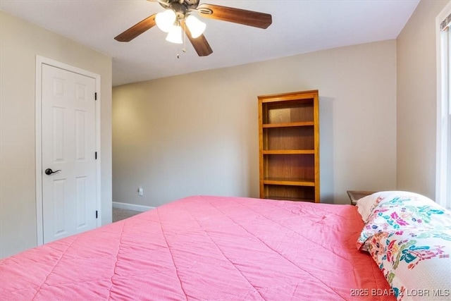 97 Random Rd, Edwards, MO 65326 - bedroom featuring ceiling fan and carpet