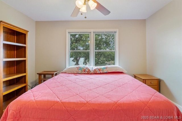 97 Random Rd, Edwards, MO 65326 - bedroom with ceiling fan