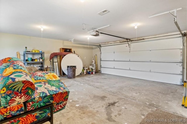 97 Random Rd, Edwards, MO 65326 - garage with a garage door opener