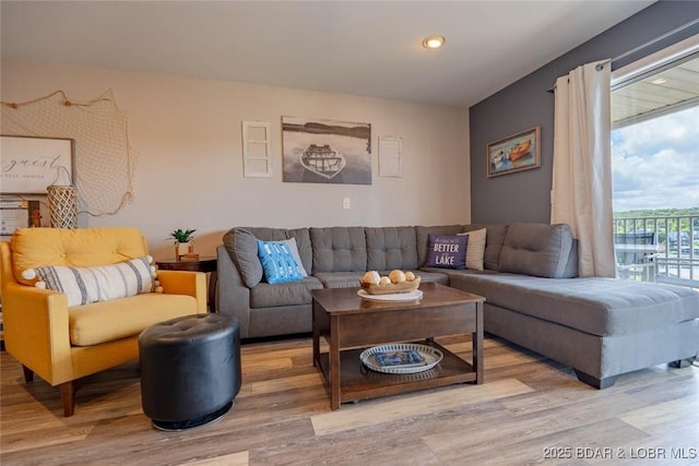 1481 Ledges Dr Unit C24, Osage Beach, MO 65065 - living room with light wood-style flooring and recessed lighting
