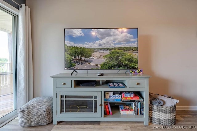 1481 Ledges Dr Unit C24, Osage Beach, MO 65065 - bar area with wood finished floors and baseboards