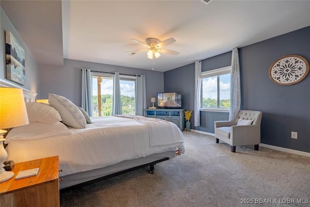 1481 Ledges Dr Unit C24, Osage Beach, MO 65065 - carpeted bedroom with baseboards and ceiling fan
