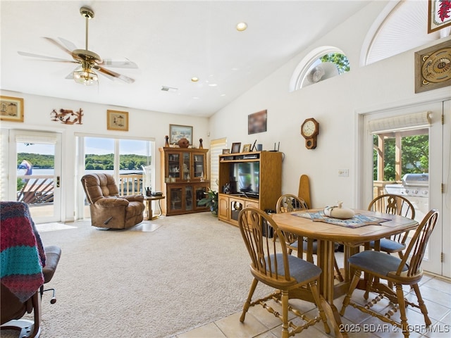 1620 Triple Cove Ln, Climax Springs, MO 65324 - dining space with plenty of natural light, a ceiling fan, recessed lighting, light tile patterned flooring, and light colored carpet