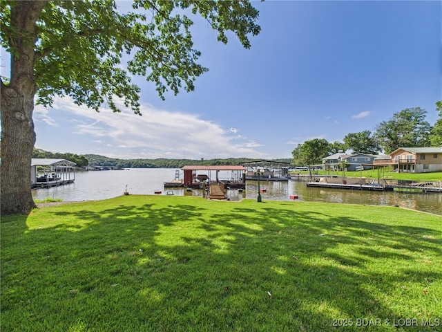 1620 Triple Cove Ln, Climax Springs, MO 65324 - dock featuring a water view, a yard, and boat lift