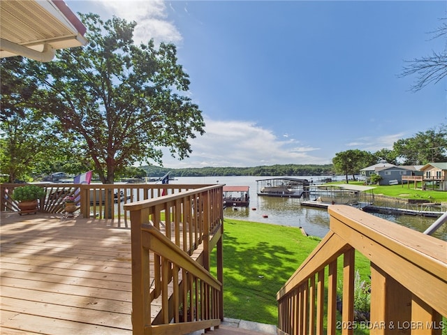 1620 Triple Cove Ln, Climax Springs, MO 65324 - deck with a water view, a lawn, and a boat dock