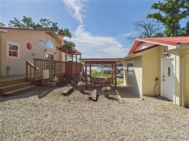 1620 Triple Cove Ln, Climax Springs, MO 65324 - view of playground with a patio and a wooden deck