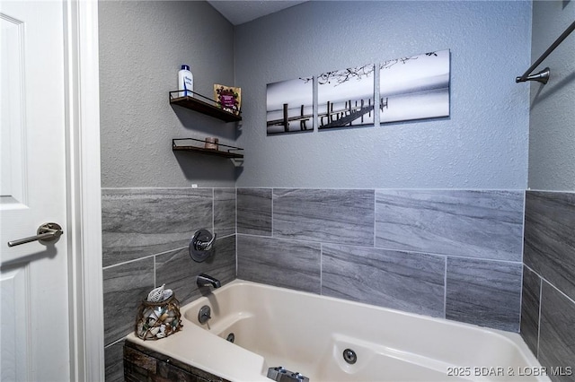 35 Casa Blanca Ct Unit 220-1A, Lake Ozark, MO 65049 - bathroom featuring a textured wall and a whirlpool tub