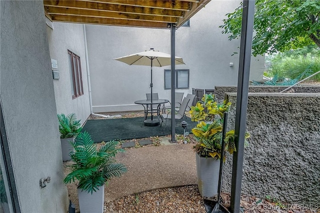 35 Casa Blanca Ct Unit 220-1A, Lake Ozark, MO 65049 - view of patio with outdoor dining area