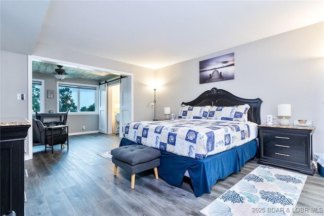 35 Casa Blanca Ct Unit 220-1A, Lake Ozark, MO 65049 - bedroom with wood finished floors and baseboards