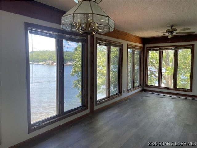 192 Ke Jo Point Rd, Gravois Mills, MO 65037 - unfurnished sunroom featuring a water view, healthy amount of natural light, and a chandelier