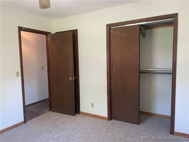 192 Ke Jo Point Rd, Gravois Mills, MO 65037 - unfurnished bedroom with carpet, a closet, and a textured ceiling