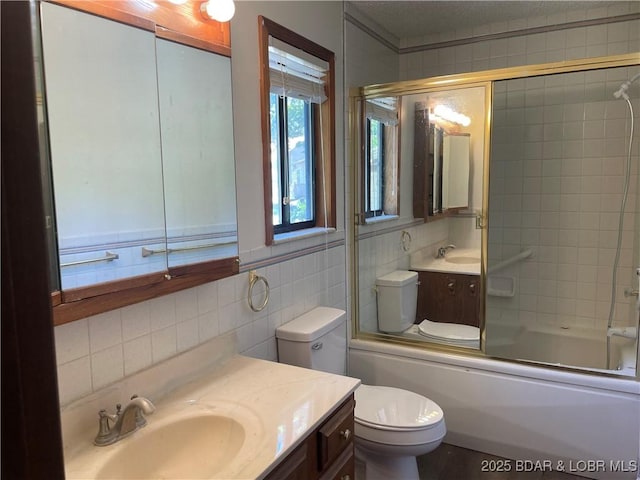 192 Ke Jo Point Rd, Gravois Mills, MO 65037 - full bathroom featuring vanity, shower / bath combination with glass door, tile walls, and backsplash