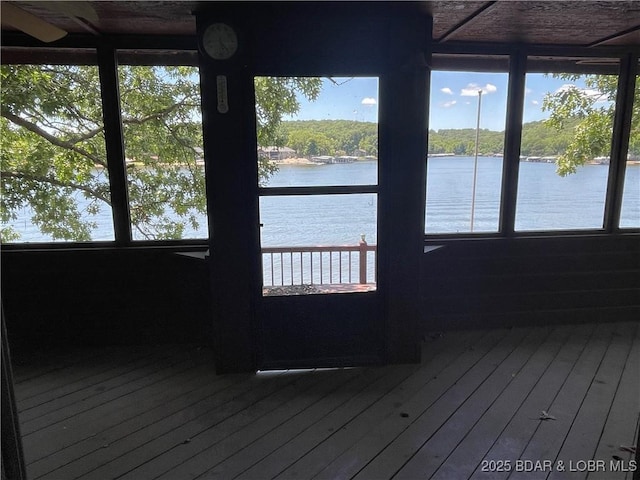 192 Ke Jo Point Rd, Gravois Mills, MO 65037 - unfurnished sunroom featuring a water view and plenty of natural light