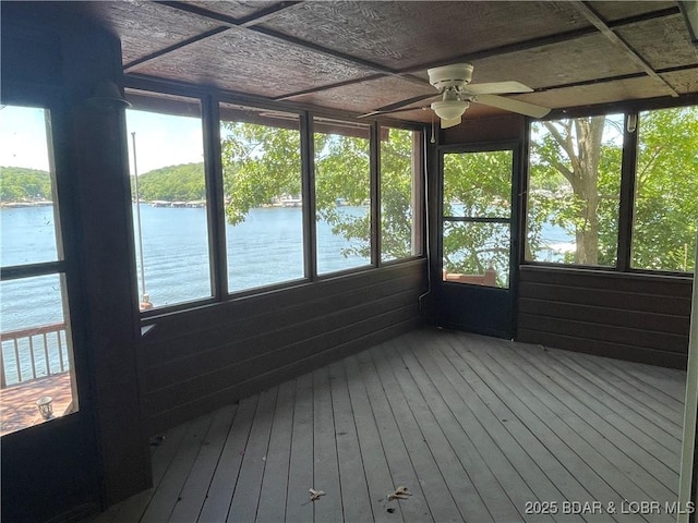 192 Ke Jo Point Rd, Gravois Mills, MO 65037 - unfurnished sunroom with a water view, a ceiling fan, and plenty of natural light