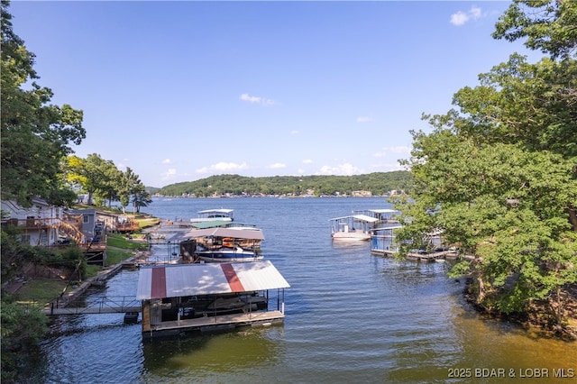 15617 Santa Fe Trl, Gravois Mills, MO 65037 - dock with a water view and boat lift