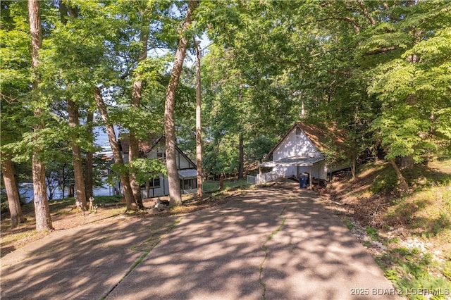 15617 Santa Fe Trl, Gravois Mills, MO 65037 - view of front of house with concrete driveway