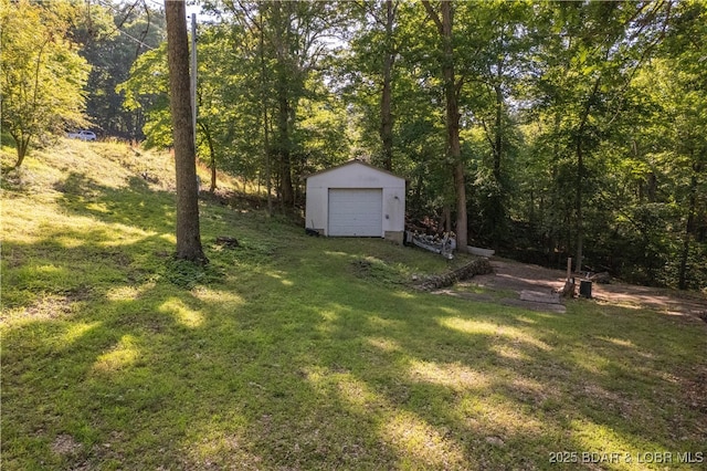 15617 Santa Fe Trl, Gravois Mills, MO 65037 - view of grassy yard featuring a storage shed and a view of trees