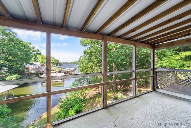 15617 Santa Fe Trl, Gravois Mills, MO 65037 - unfurnished sunroom featuring a water view