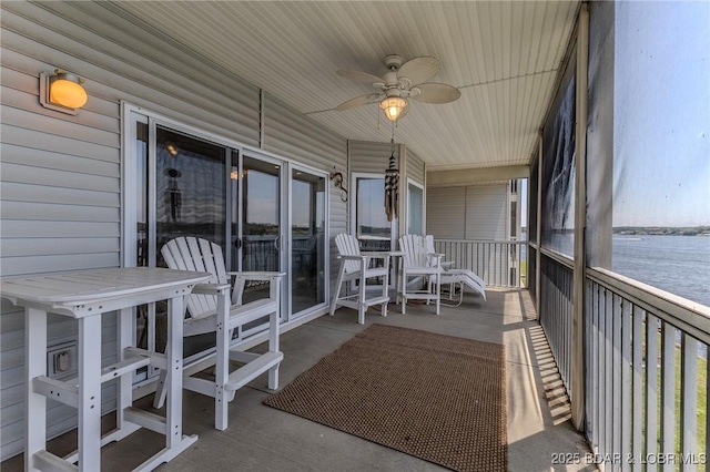 492 Regatta Bay Dr Unit 2D, Lake Ozark, MO 65049 - sunroom / solarium with ceiling fan and a water view