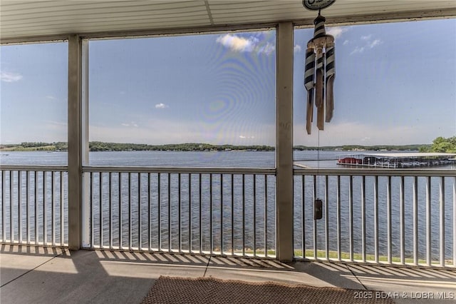 492 Regatta Bay Dr Unit 2D, Lake Ozark, MO 65049 - unfurnished sunroom with a water view
