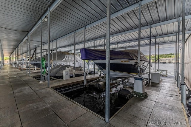492 Regatta Bay Dr Unit 2D, Lake Ozark, MO 65049 - dock featuring boat lift