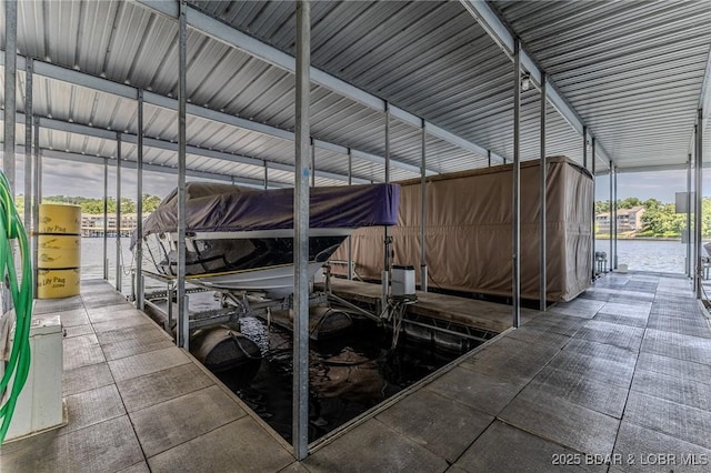 492 Regatta Bay Dr Unit 2D, Lake Ozark, MO 65049 - dock area featuring boat lift