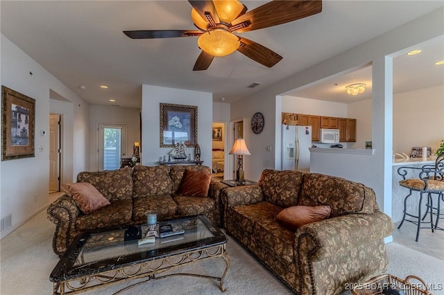 492 Regatta Bay Dr Unit 2D, Lake Ozark, MO 65049 - living area with light carpet, recessed lighting, and a ceiling fan