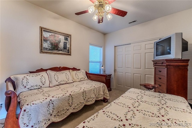 492 Regatta Bay Dr Unit 2D, Lake Ozark, MO 65049 - bedroom featuring a closet, carpet floors, and ceiling fan