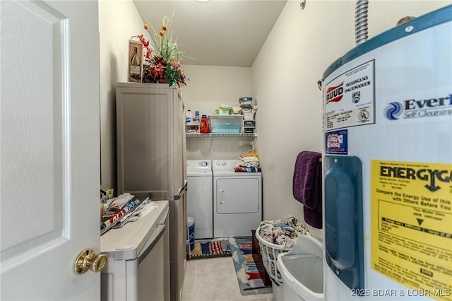 492 Regatta Bay Dr Unit 2D, Lake Ozark, MO 65049 - laundry area featuring washer and clothes dryer, electric water heater, and light tile patterned floors