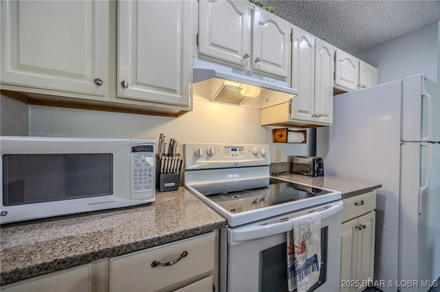 6570 Pelican Dr Unit 404, Osage Beach, MO 65065 - kitchen with white appliances, under cabinet range hood, white cabinetry, and light stone counters