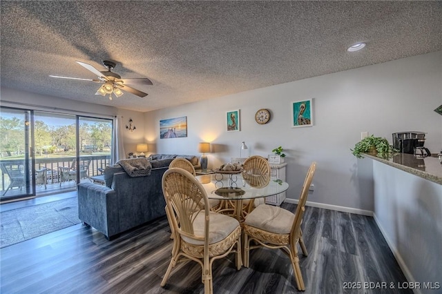 6570 Pelican Dr Unit 404, Osage Beach, MO 65065 - dining room featuring dark wood-style flooring, a ceiling fan, a textured ceiling, and recessed lighting