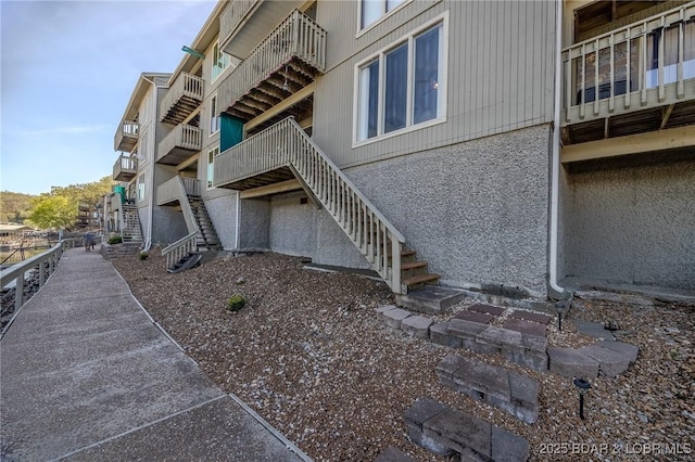 6570 Pelican Dr Unit 404, Osage Beach, MO 65065 - view of property featuring stairway