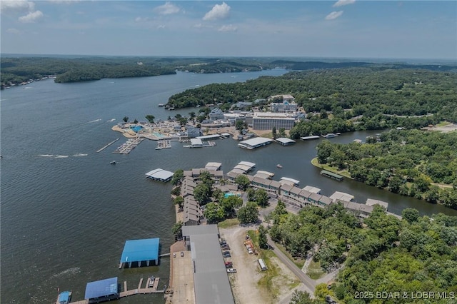 6570 Pelican Dr Unit 404, Osage Beach, MO 65065 - drone / aerial view of a nearby body of water and a forest