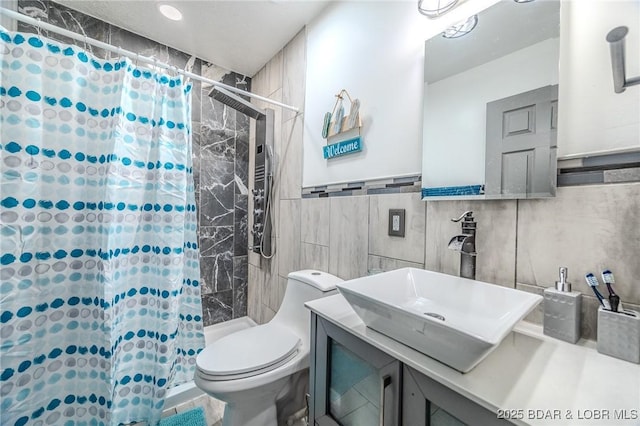 54 White Rock Ln, Sunrise Beach, MO 65079 - bathroom with tile walls, vanity, and a tile shower