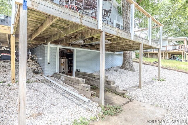 54 White Rock Ln, Sunrise Beach, MO 65079 - view of home's exterior featuring water heater