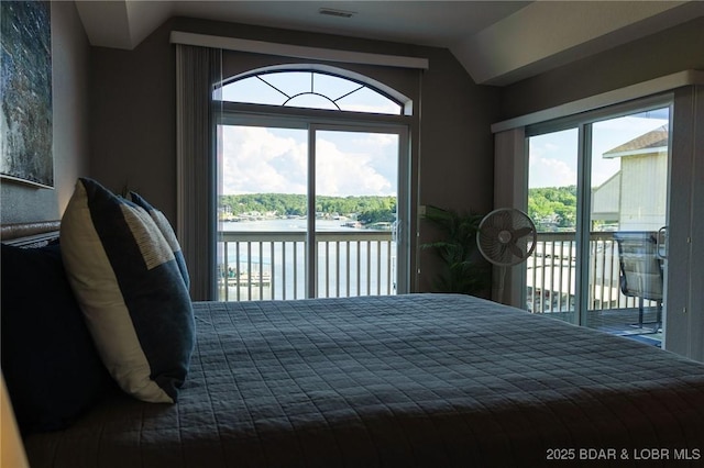 46 Aqua Fin Dr Unit 4A, Lake Ozark, MO 65049 - bedroom with access to outside, a water view, and vaulted ceiling