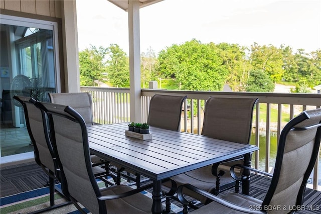 46 Aqua Fin Dr Unit 4A, Lake Ozark, MO 65049 - wooden deck featuring outdoor dining space