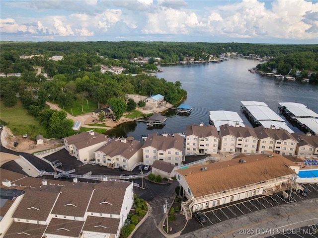 46 Aqua Fin Dr Unit 4A, Lake Ozark, MO 65049 - bird's eye view of a nearby body of water and a heavily wooded area