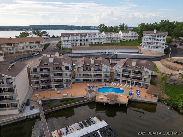 46 Aqua Fin Dr Unit 4A, Lake Ozark, MO 65049 - aerial view of a pool area and a large body of water
