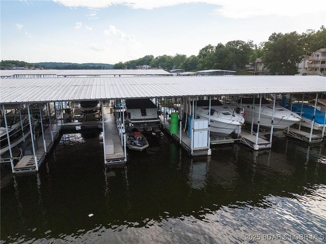 46 Aqua Fin Dr Unit 4A, Lake Ozark, MO 65049 - dock area with boat lift and a water view