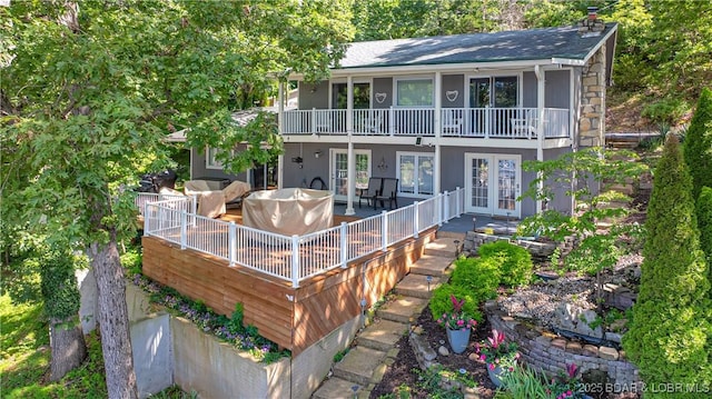161 Tanglewood Dr, Camdenton, MO 65020 - rear view of house featuring french doors, an outdoor hangout area, a deck, and roof with shingles