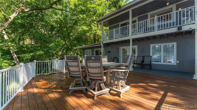 161 Tanglewood Dr, Camdenton, MO 65020 - wooden deck featuring outdoor dining area