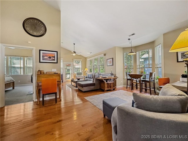 110 Golf View Dr, Camdenton, MO 65020 - living room featuring light wood-style floors, ceiling fan, and high vaulted ceiling