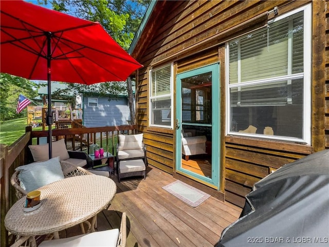 110 Golf View Dr, Camdenton, MO 65020 - wooden deck with outdoor lounge area