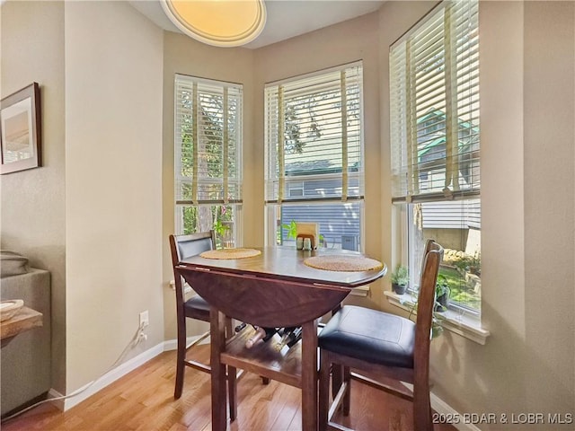110 Golf View Dr, Camdenton, MO 65020 - dining area featuring light wood finished floors and baseboards