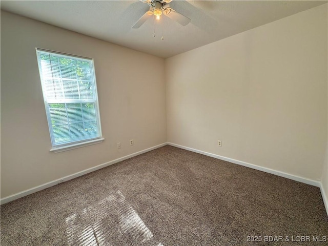868 E St, Lebanon, MO 65536 - empty room featuring carpet flooring and a ceiling fan